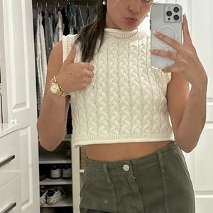 off white knitted sleeveless shirt